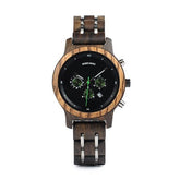 Men's wooden watch by Memories but Unique with a round wooden face and leather strap, displayed on a neutral background.