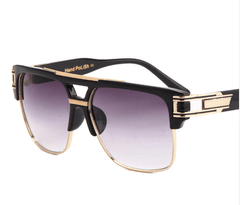 Men's sunglasses by Memories but Unique, featuring stylish frame and tinted lenses for UV protection and modern fashion.
