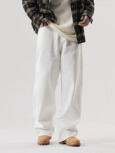 Men's plus size wide leg jeans in washed stretch cotton denim, showcasing the relaxed fit and classic denim texture.