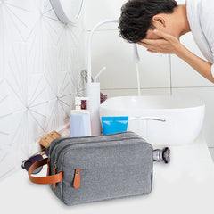 Men's travel toiletry bag by Memories but Unique with skincare storage compartments and durable fabric.