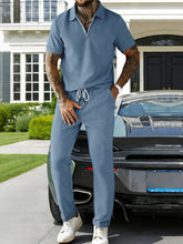 Men's plus size casual zipper polo shirt and drawstring pants set by Trendsi, featuring a comfortable fit and stylish design.
