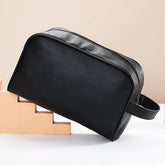 Men's travel cosmetic bag in PU leather by Zen, featuring a sleek toiletry organizer with multiple compartments for grooming essentials.