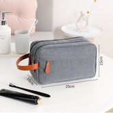 Men's travel toiletry bag by Memories but Unique, featuring compartments for skincare storage and organization.