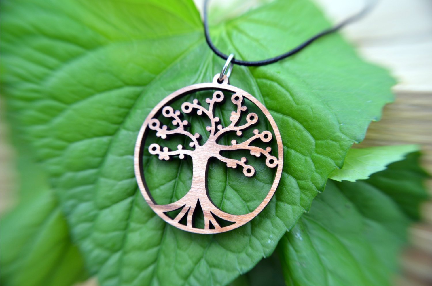 Tree of Life pendant in cherry wood on leather cord by DC-GioGio Design, natural jewelry with bamboo and wooden accents.