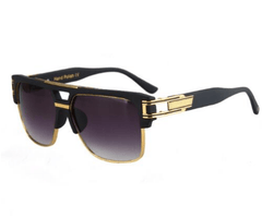 Men's sunglasses by Memories but Unique with dark tinted lenses and black frame, stylish and protective eyewear.