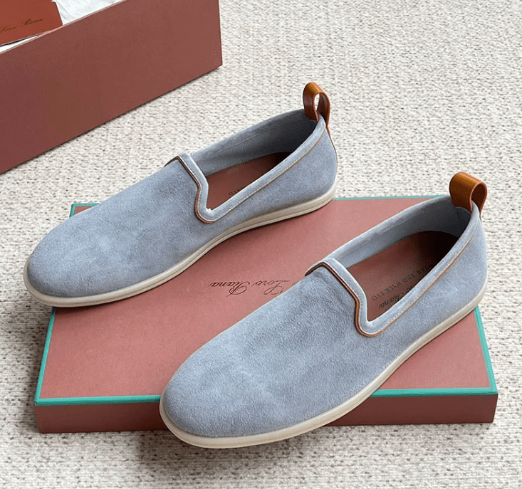 Men's casual shoes by Memories but Unique featuring brown leather uppers and white rubber soles.