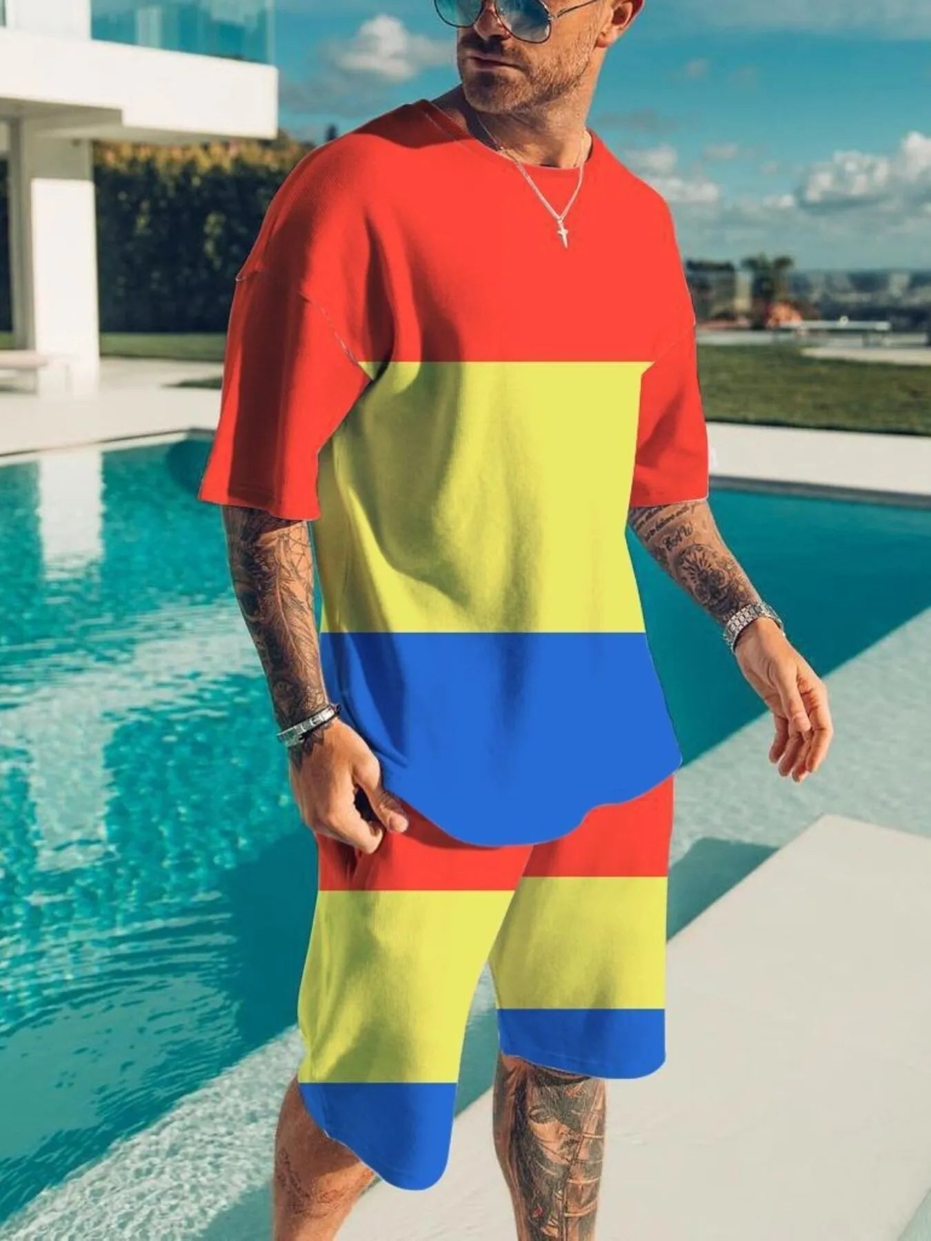 Men's color block tee and shorts set in plus size by Trendsi, featuring a casual, comfortable two-piece outfit with vibrant color blocks.