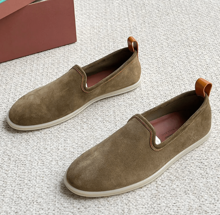 Men's casual shoes by Memories but Unique, featuring brown leather with white laces and a comfortable rubber sole.