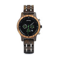 Men's wooden watch by Memories but Unique with a round wooden face and leather strap, displayed on a neutral background.