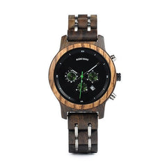 Men's wooden watch by Memories but Unique with a round wooden face and leather strap, displayed on a neutral background.