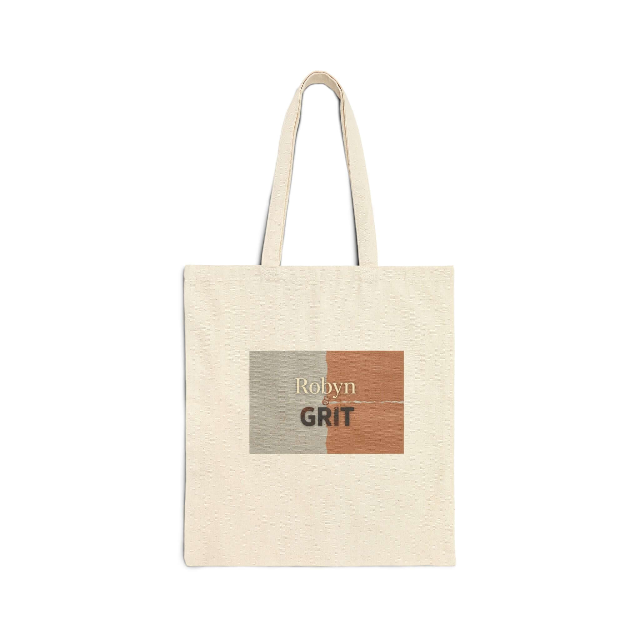 Canvas tote bag with sunflower and inspirational "Grit" design, featuring sturdy handles and a spacious interior.