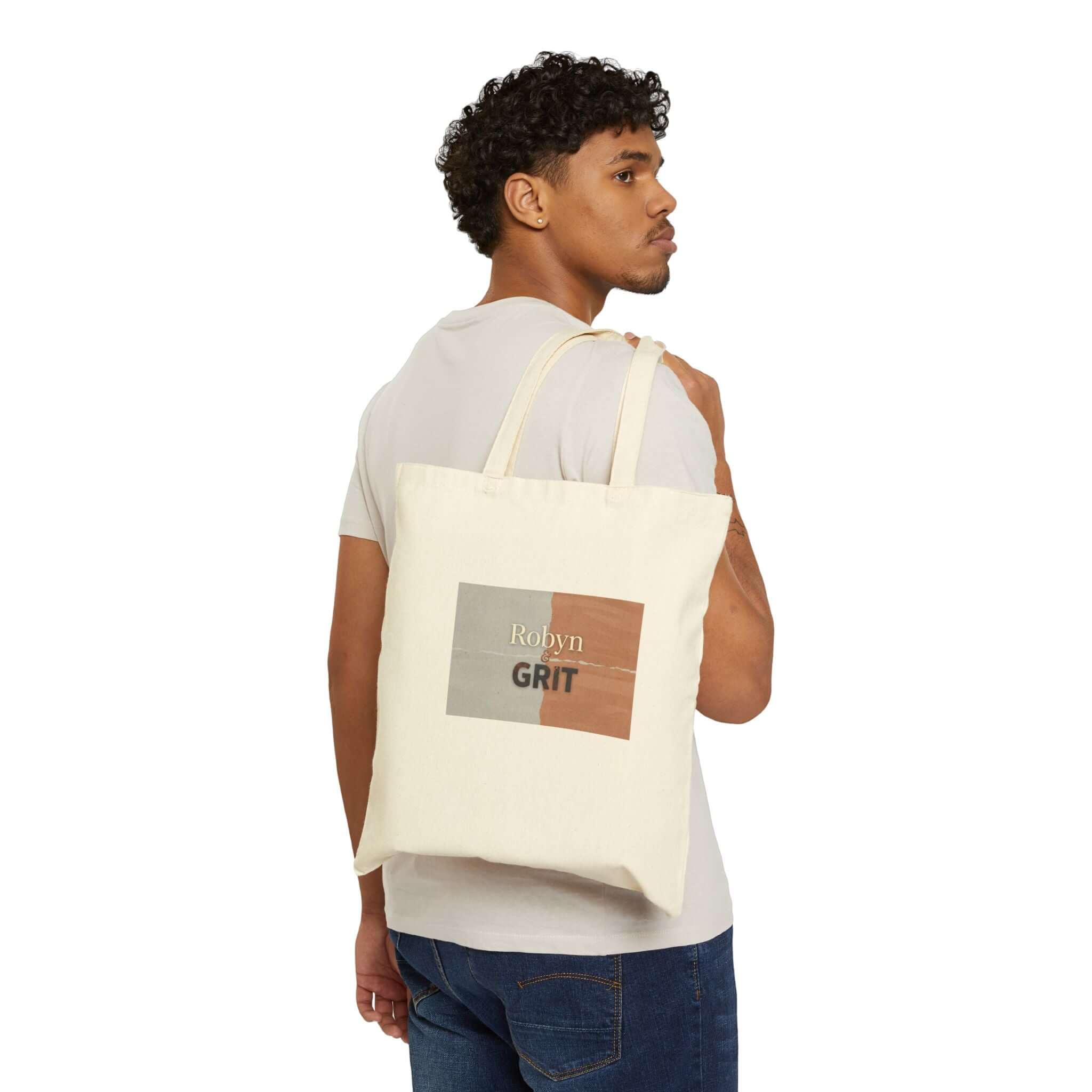 Canvas tote bag with sunflower design and inspirational "Grit" quote, featuring sturdy handles and eco-friendly material.