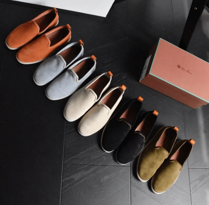 Men's casual shoes by Memories but Unique featuring brown leather uppers and white rubber soles.