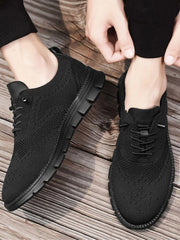Men's mesh lace-up athletic sneakers by Trendsi with breathable PU leather and rubber sole, designed for comfort and style.