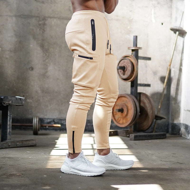 Men's camouflage casual overalls from Memories but Unique, featuring cotton fabric, zipper details, and versatile sports-inspired design.