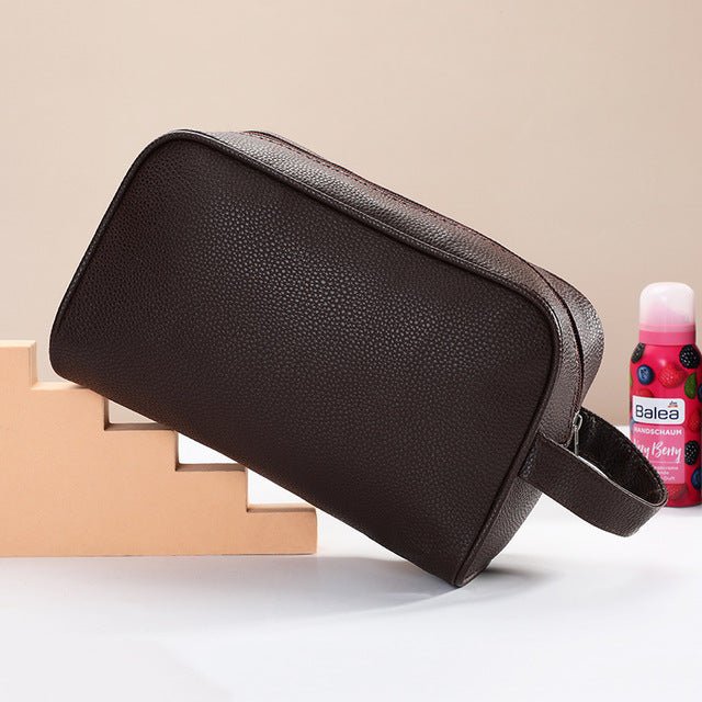 Men's travel cosmetic bag made of PU leather, Zen toiletry organizer with multiple compartments for grooming essentials.