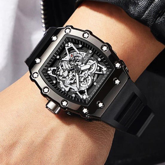 Luminous Men's Watch by Memories but Unique showing a sleek black dial with luminous hands and a metal strap.