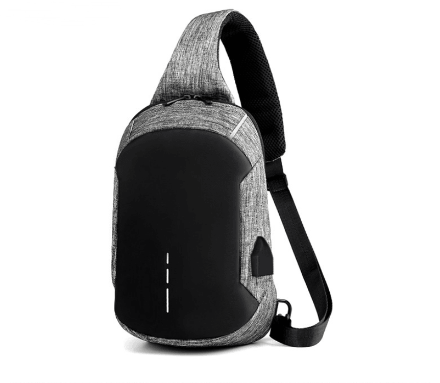 Waterproof anti-theft men's travel chest bag from Memories but Unique, featuring secure compartments and adjustable straps.