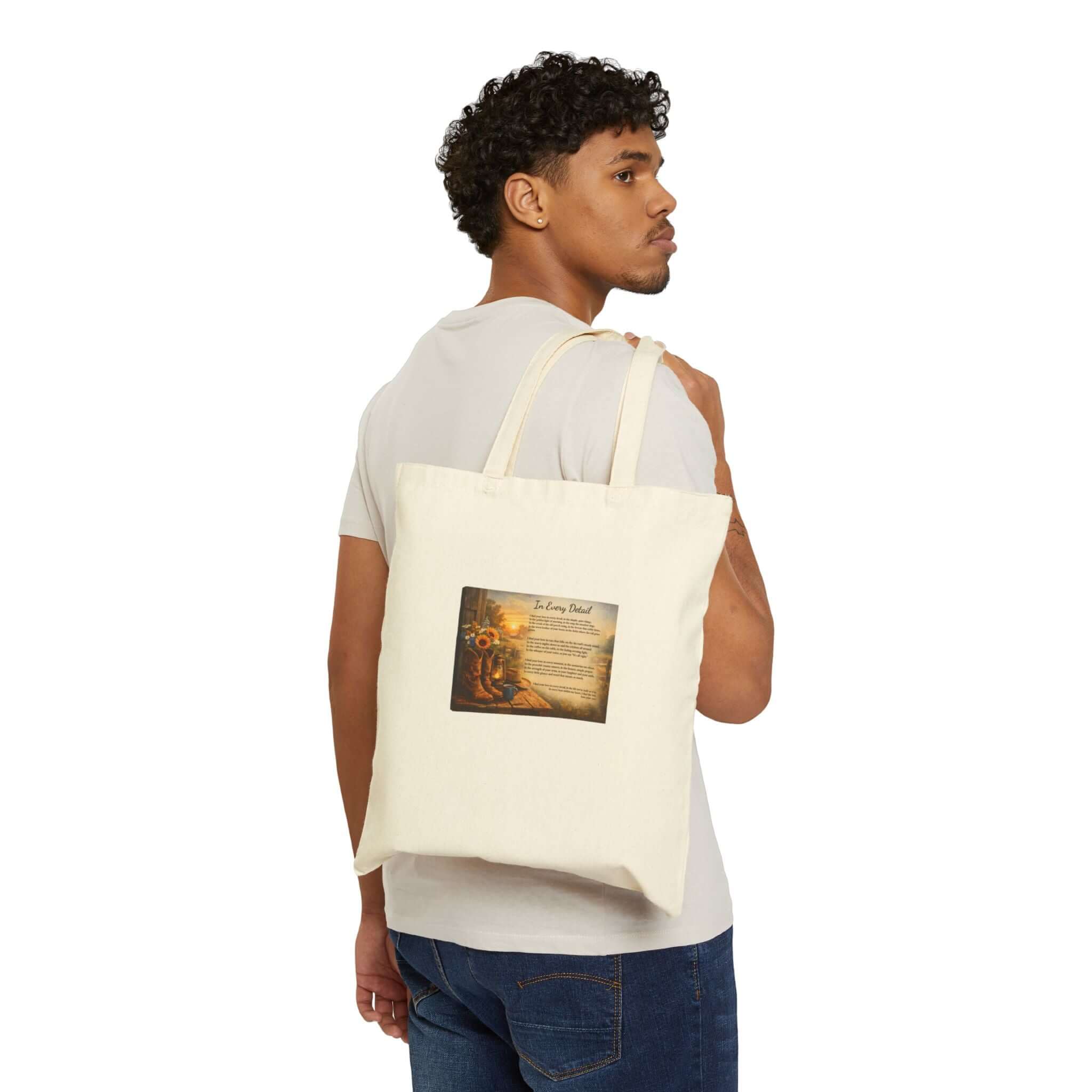 Canvas tote bag with sunflower design and inspirational "Grit" print, featuring sturdy handles and eco-friendly material.