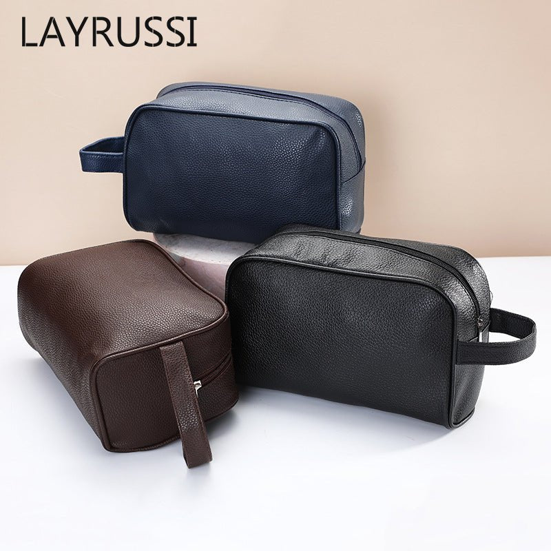 Men's travel cosmetic bag in PU leather, Zen toiletry organizer with multiple compartments for grooming essentials.