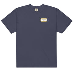 Men’s High Flying Sailor heavyweight T-shirt by Memories but Unique, featuring nautical sailor graphic on soft cotton fabric.