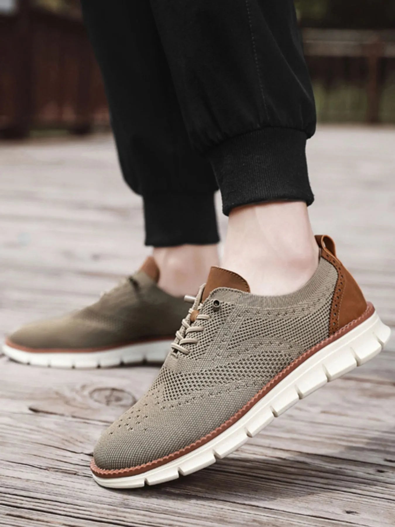 Men's breathable mesh and PU leather athletic sneakers with lace-up design and rubber soles by Trendsi.
