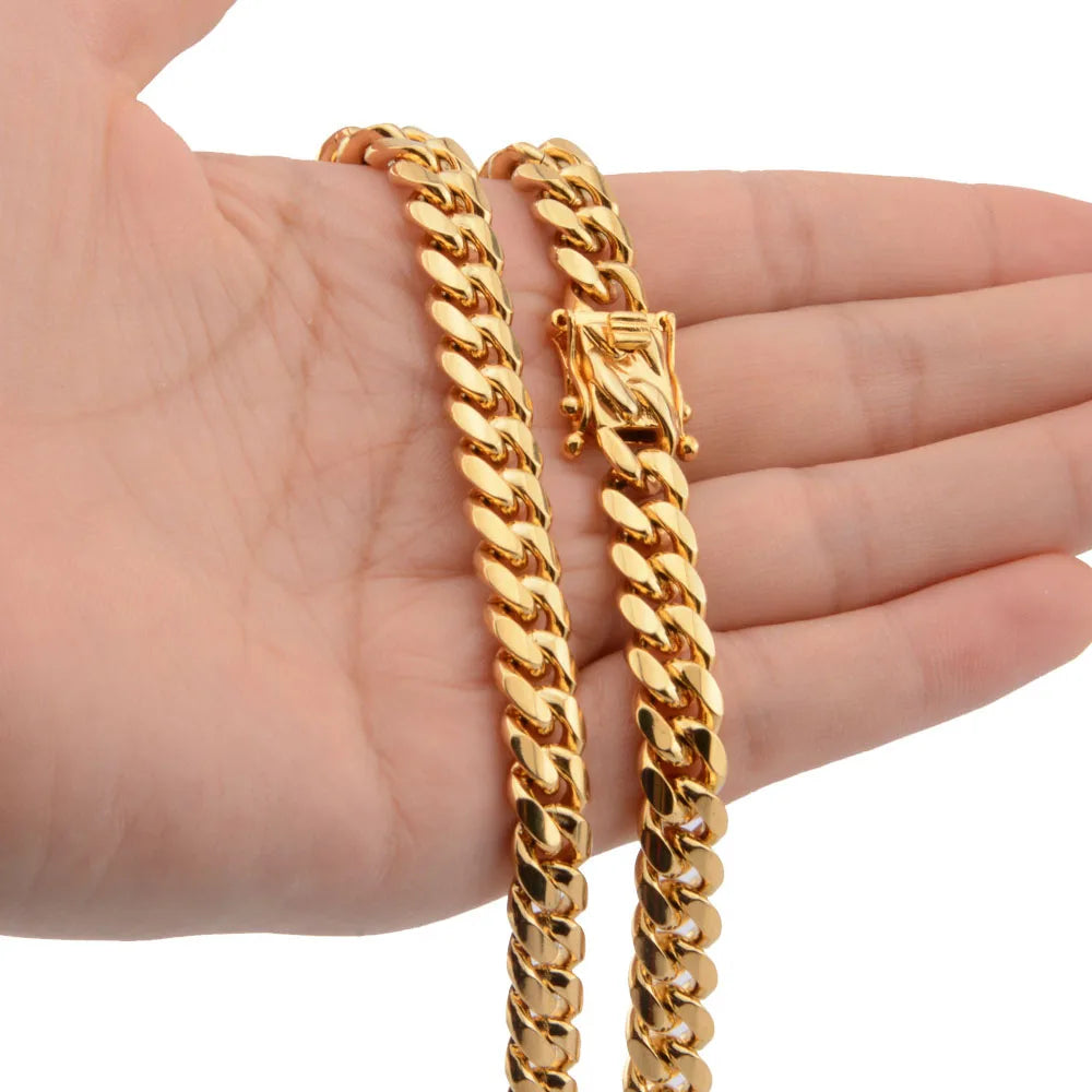 Stainless steel Miami curb Cuban chain necklace with dragon lock clasp, men's jewelry featuring a bold, textured design.
