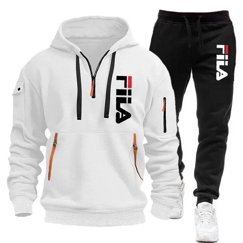 Two sets of fashionable men's sportswear by Memories but Unique, featuring zippered hooded sweatshirts and matching sweatpants for casual fitness.