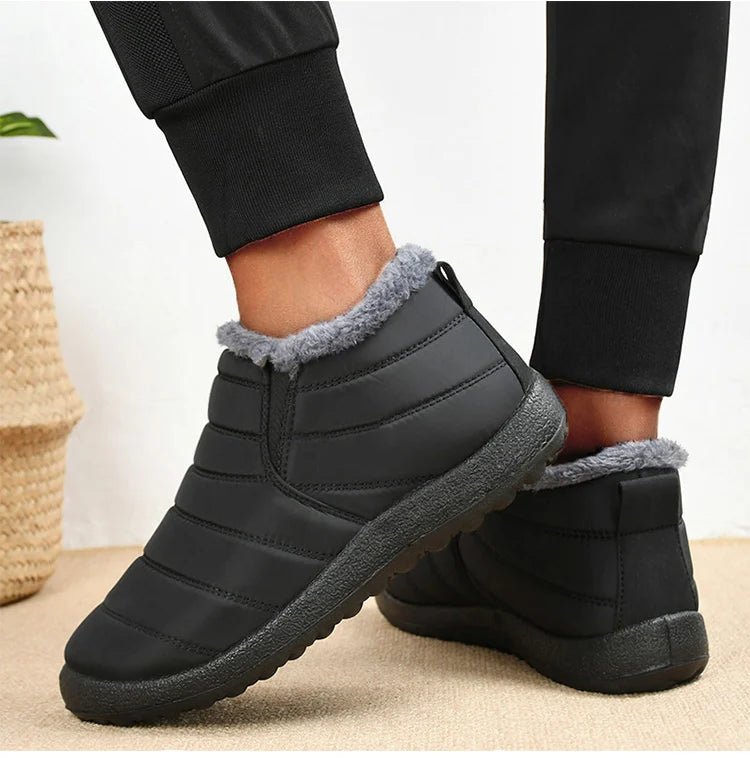 Men's slip-on winter ankle boots by Memories but Unique, waterproof fur-lined snow boots with casual, warm, and waterproof design.