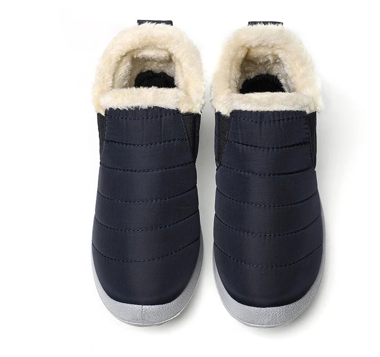Men's waterproof winter slip-on ankle boots with fur lining, casual snow boots by Memories but Unique, suitable for cold weather.