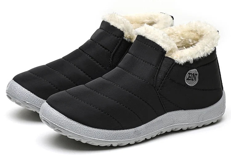 Men's waterproof winter slip-on boots with fur lining, ankle height, casual waterproof snow boots by Memories but Unique.