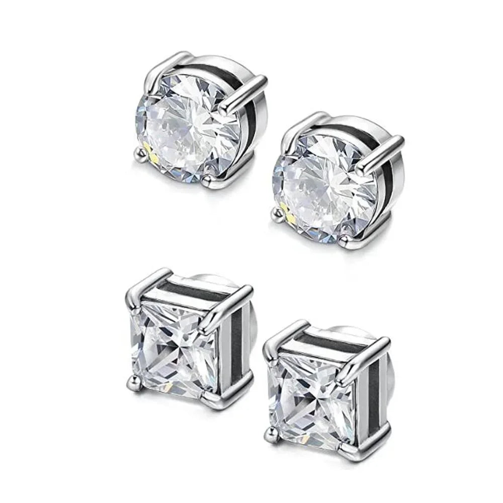 Two punk-style magnetic ear stud earrings with cross design, non-piercing fake earrings for men, in black and silver tones.