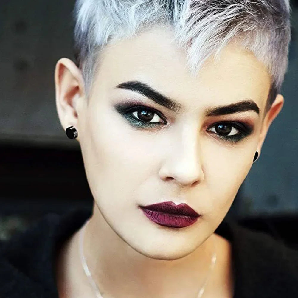 Pair of punk-style magnetic ear studs by Memories but Unique, featuring cross designs, non-piercing earrings for men.