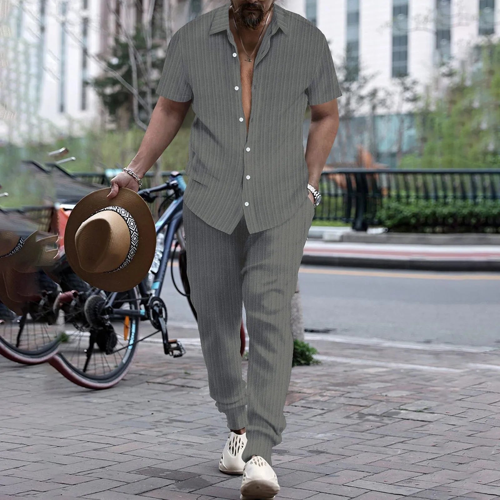 Casual men's short sleeve shirt and beach pants two-piece summer set by Memories but Unique, featuring a comfortable blouse and pants ensemble.