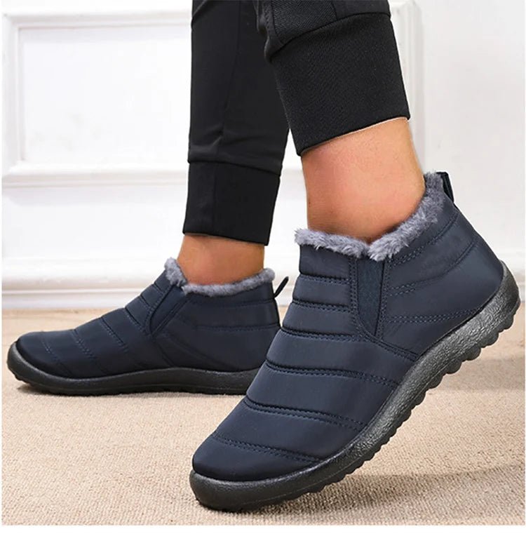 Men's slip-on winter ankle boots with fur lining, waterproof snow boots by Memories but Unique, featuring a warm casual design.