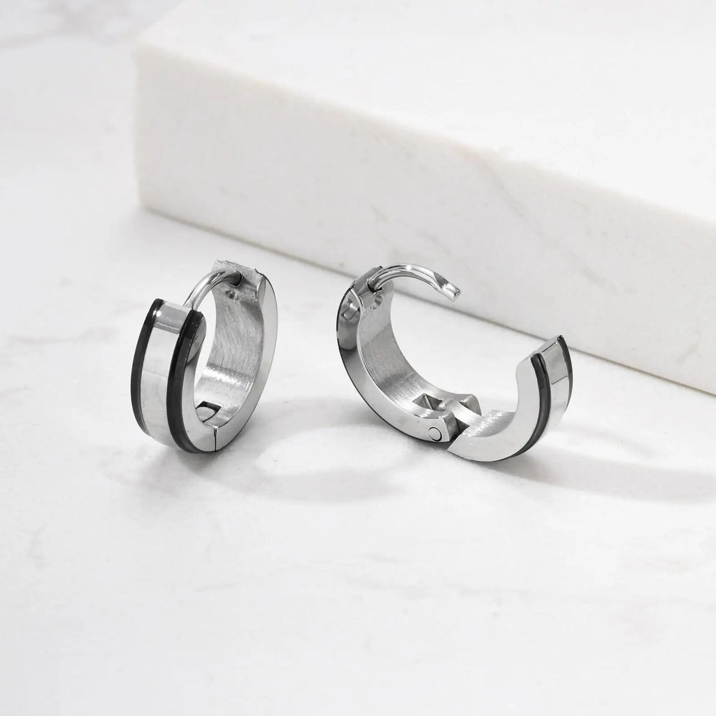 Simple men's stainless steel circle huggies hoop earrings from Memories but Unique, casual jewelry with a sleek, modern design.