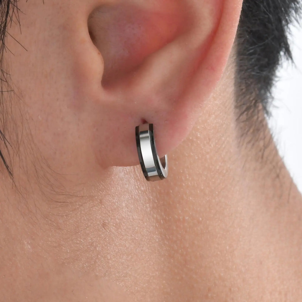 Simple men's stainless steel circle huggies hoop earrings, casual jewelry by Memories but Unique, showcasing a sleek, modern design.