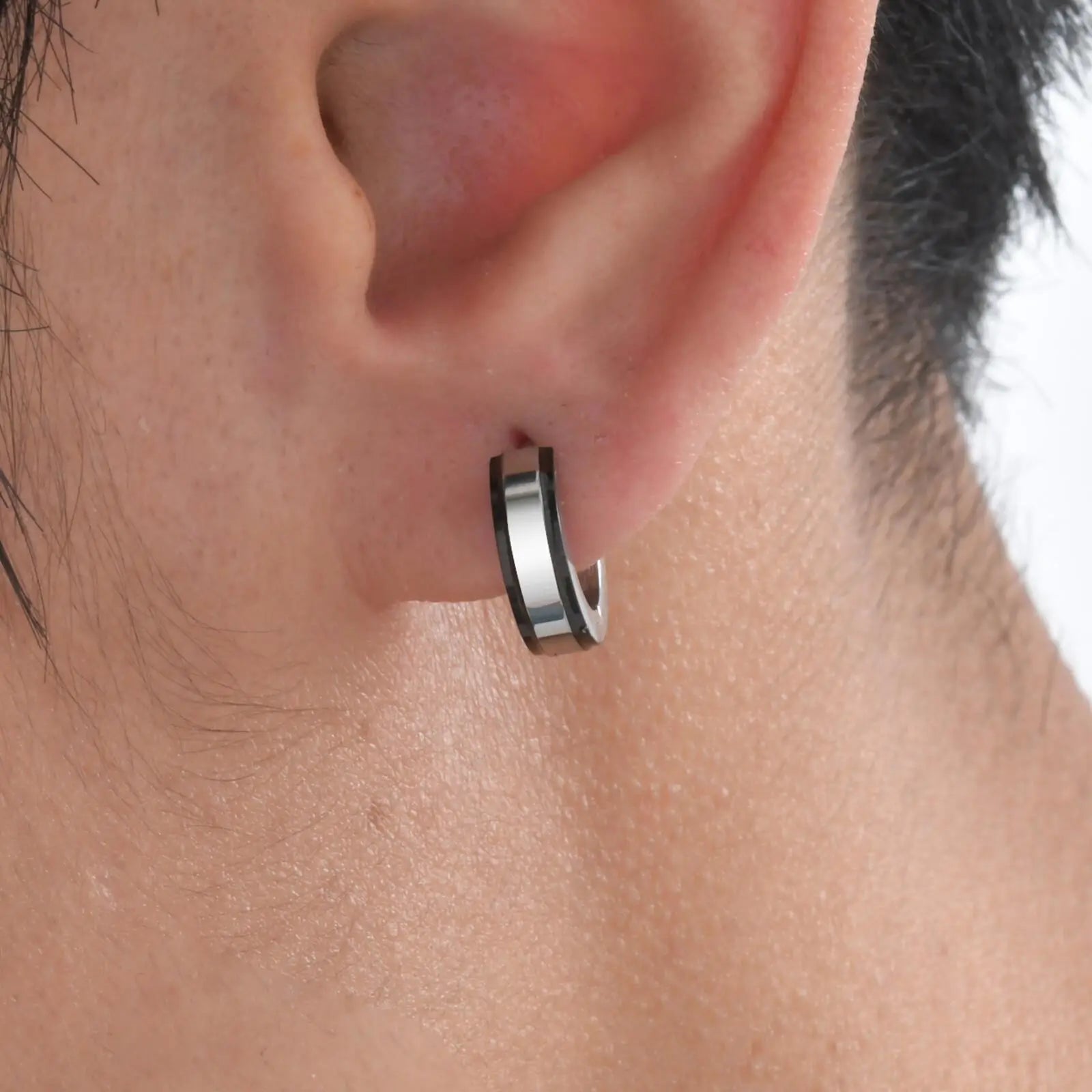 Simple men's stainless steel circle huggies hoop earrings, casual jewelry by Memories but Unique, showcasing a sleek, modern design.