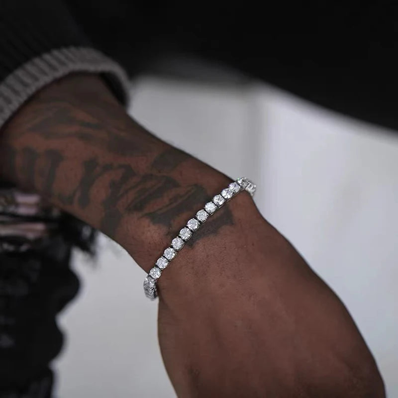 Iced out hip-hop tennis bracelet for men with cubic zirconia crystals, featuring 3/4/5mm chain design on the hand, streetwear jewelry style.