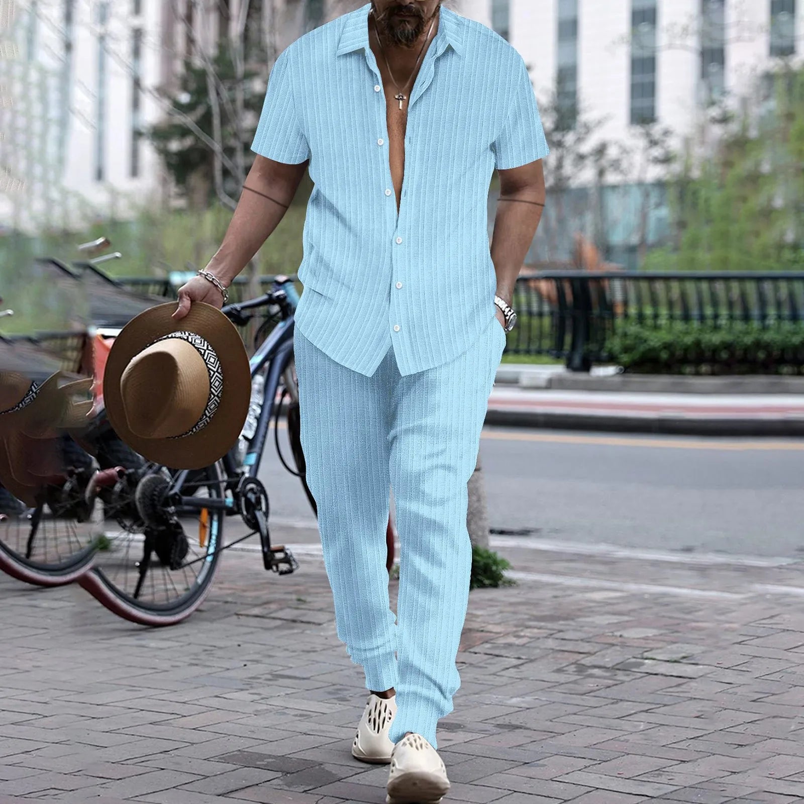 Casual men's short sleeve shirt and beach pants set by Memories but unique, featuring a stylish cardigan blouse top and summer two-piece outfit.