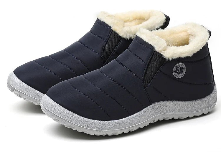 Men's waterproof slip-on winter boots by Memories but Unique, featuring fur lining and ankle design, ideal for snow and cold weather.