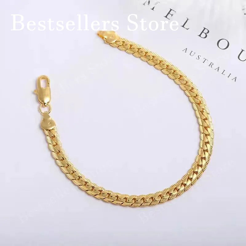Sterling silver and 18K gold embossed bracelet featuring 5mm links, stylish jewelry for men and women from Memories but Unique.
