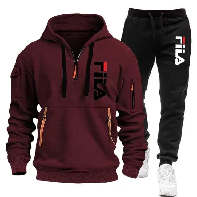 Two sets of fashionable men's sportswear from Memories but Unique, featuring zippered hooded sweatshirt and matching sweatpants for casual fitness