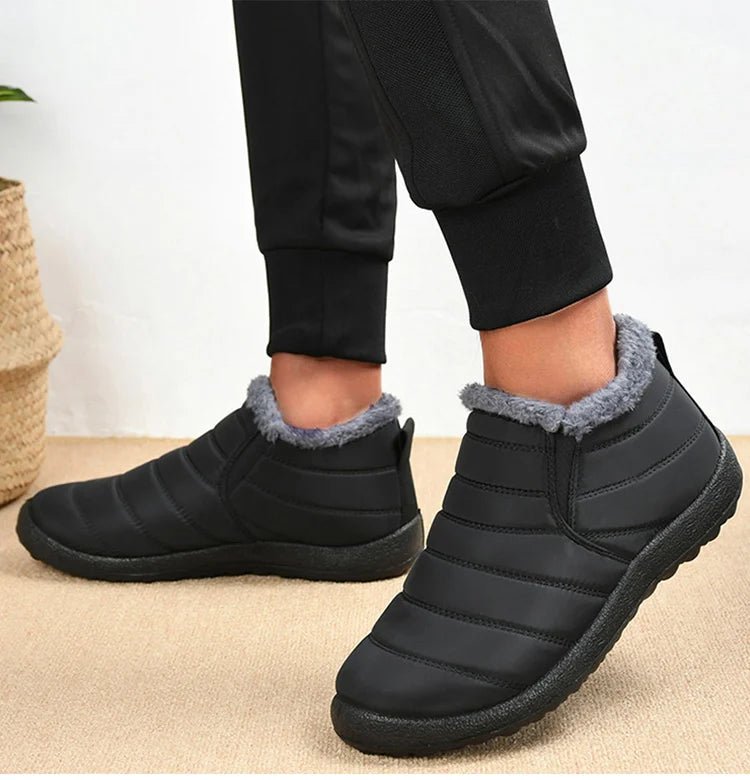 Men's slip-on winter ankle boots by Memories but Unique with waterproof fur lining, warm snow boots, and casual waterproof design.