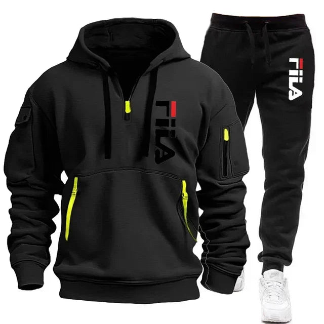 Two sets of men's sportswear by Memories but Unique, featuring zippered hooded sweatshirts and matching sweatpants for casual fitness.