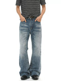 Men's vintage wash flare jeans with raw hem and pockets by Trendsi, shown with a relaxed fit and classic denim texture.