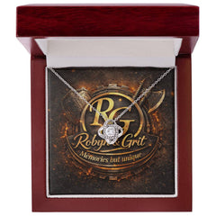 Tangled Love jewelry piece by ShineOn Fulfillment featuring intertwined silver and gold-toned design with sparkling accents.