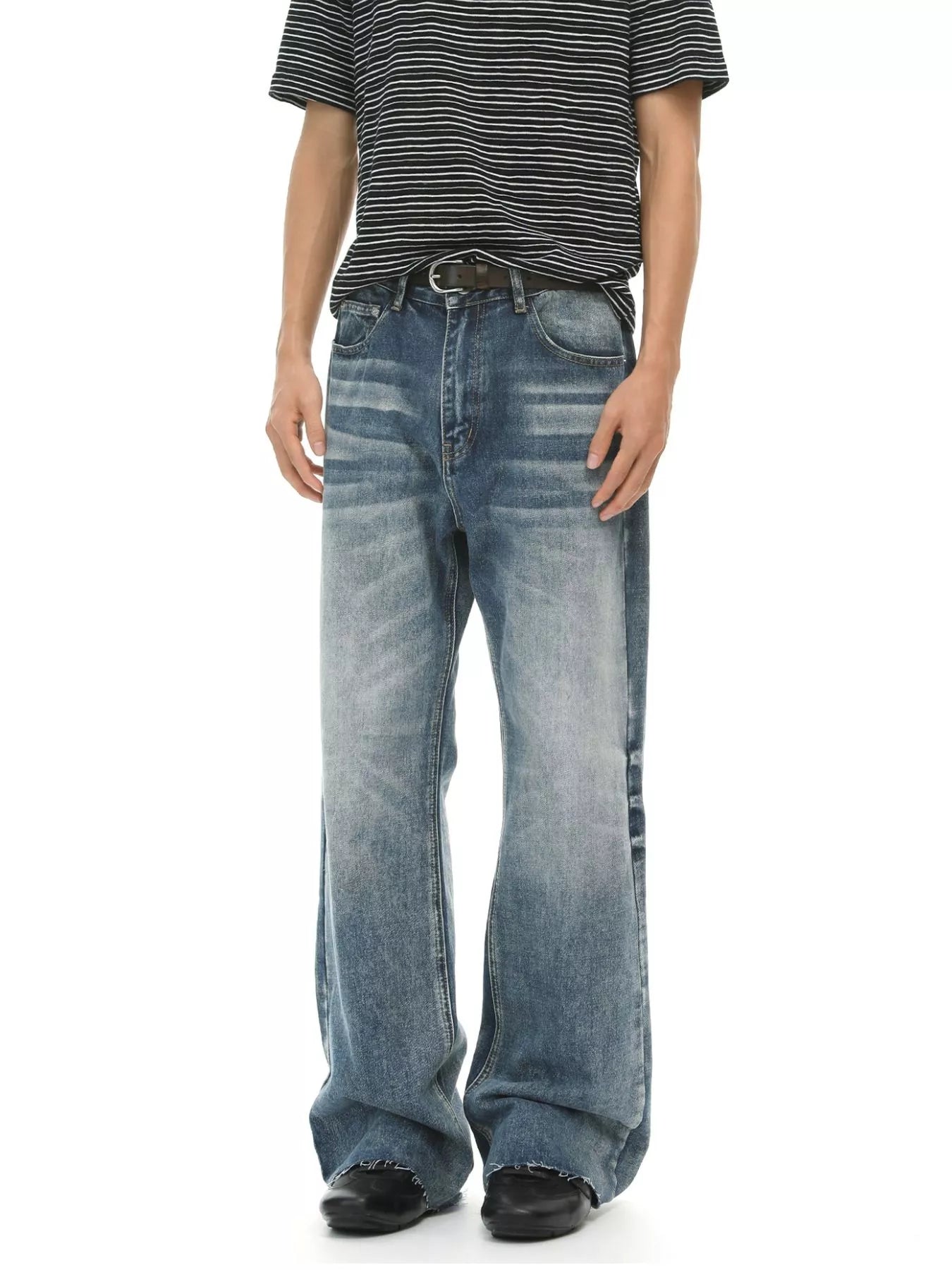 Men's vintage wash flare jeans with raw hem and pockets, branded by Trendsi, displayed on a mannequin.