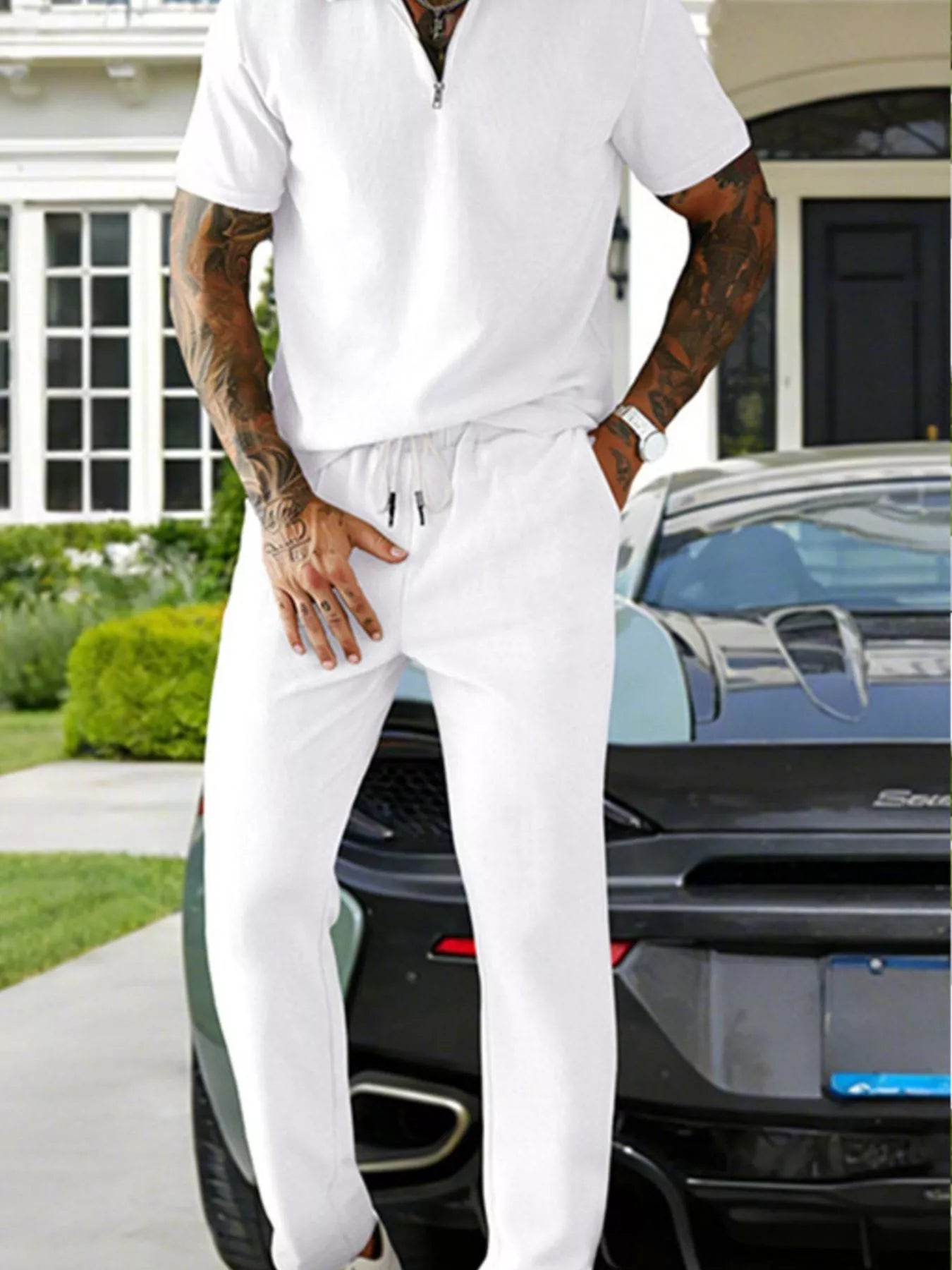 Plus size men's casual zipper polo shirt and drawstring pants set from Trendsi, featuring comfortable fabric and modern style.