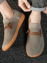 Men's breathable mesh slip-on sneakers by Trendsi, lightweight casual walking shoes with comfortable mesh uppers and slip-on design.